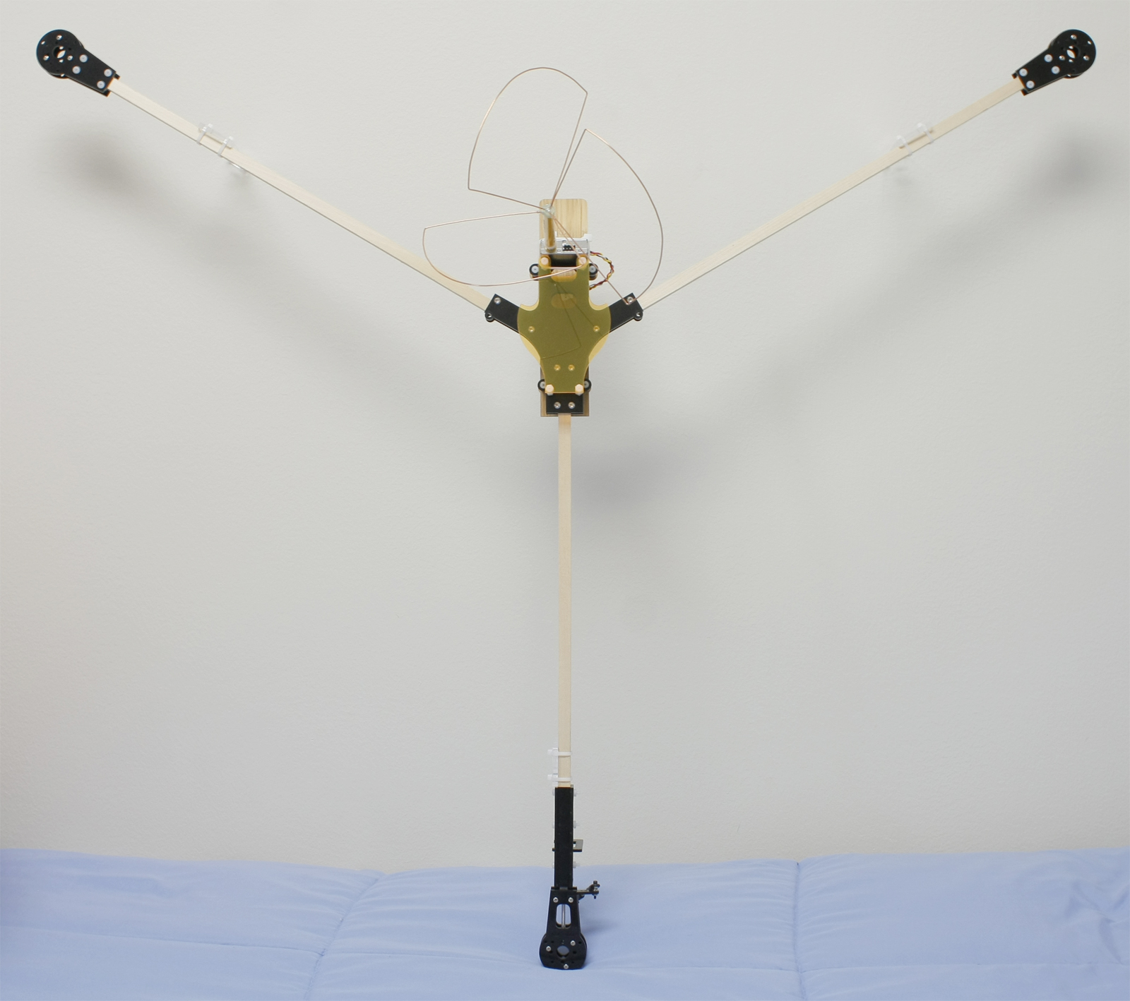 Tricopter frame with video transmitter and cloverleaf antenna mounted